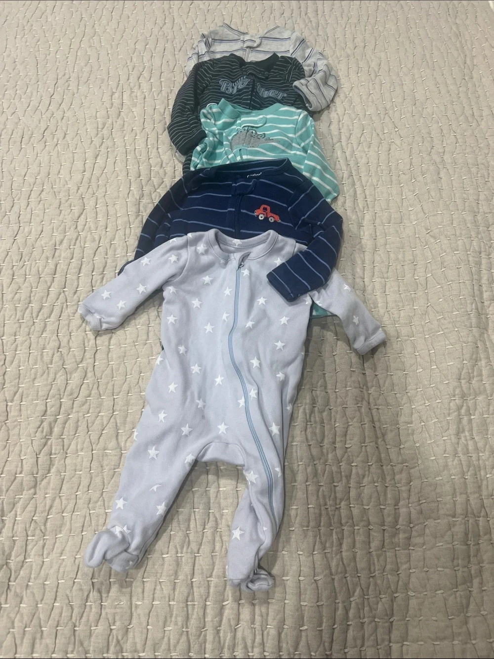 5 Newborn footed sleepers, 4 Carters and 1 Nordstrom